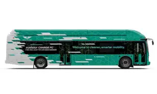 AL MY26 Xcelsior CHARGE FC bus, side image 100 260217